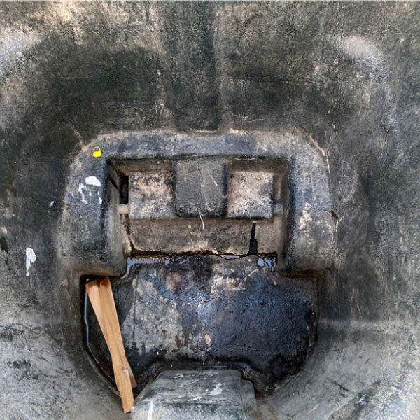Dirty trash bin with debris, dirt and foul odors before getting cleaned by BinRefresh